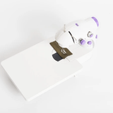 White sewing machine with a white background