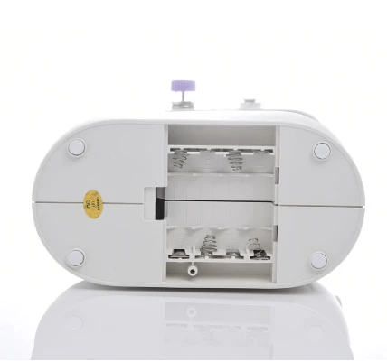 White sewing machine on a white background
