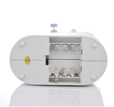 White sewing machine on a white background
