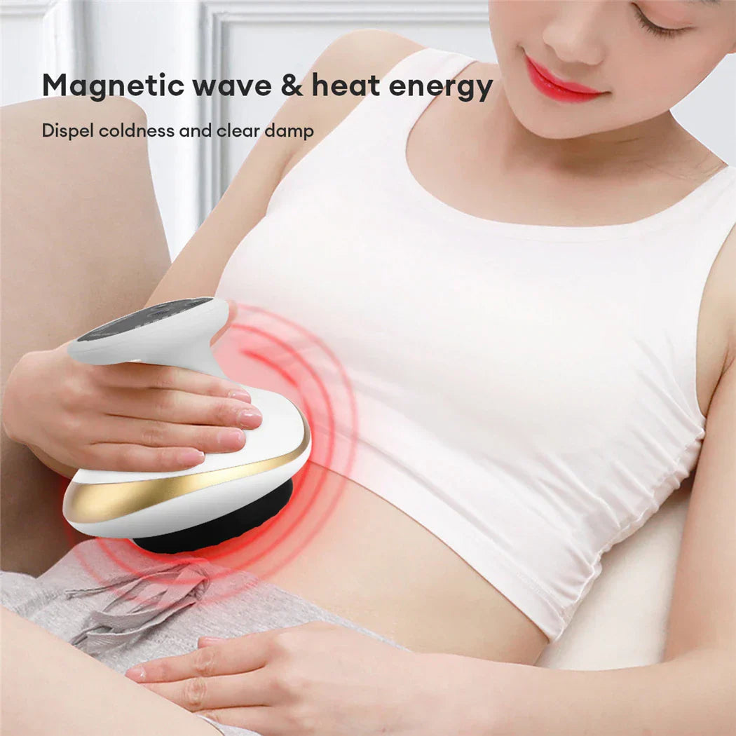 Person using a device emitting magnetic wave and heat energy on their abdomen.