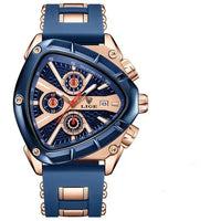 Luxury watch with blue strap and rose gold casing on a white background