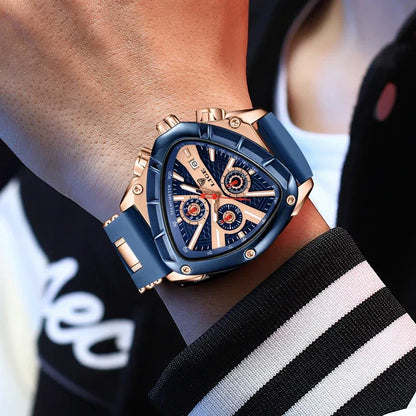 Luxury watch with blue and rose gold design on a person's wrist